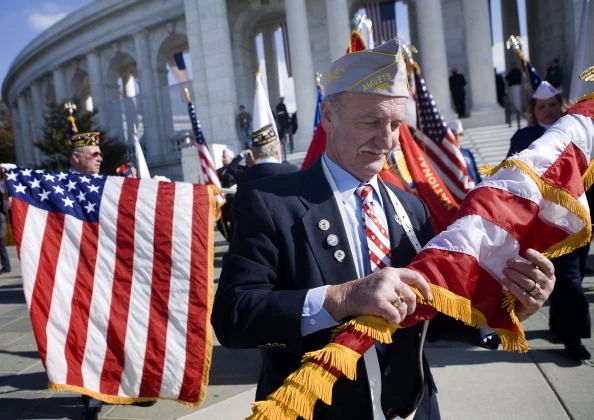 Mourners Gather At Arlington Cemetery For Veterans Day